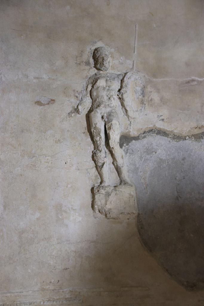 Herculaneum Suburban Baths. October 2025.
Tepidarium, stucco warrior from centre of east wall. Photo courtesy of Klaus Heese.